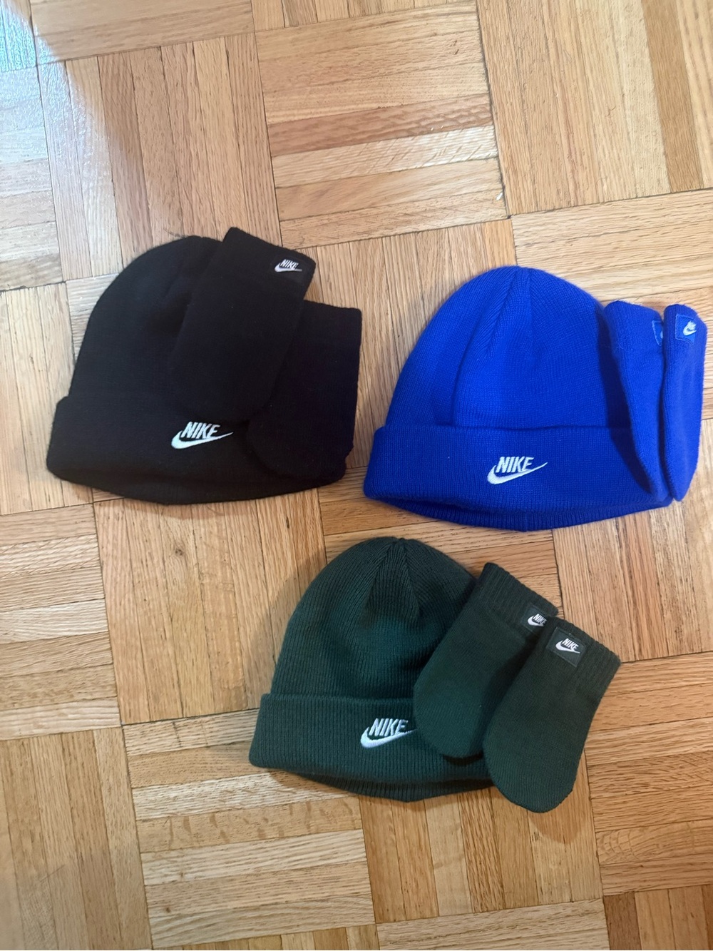 Nike Beanie Trio in Black, Royal Blue, and Forest Green Infant Sizing
